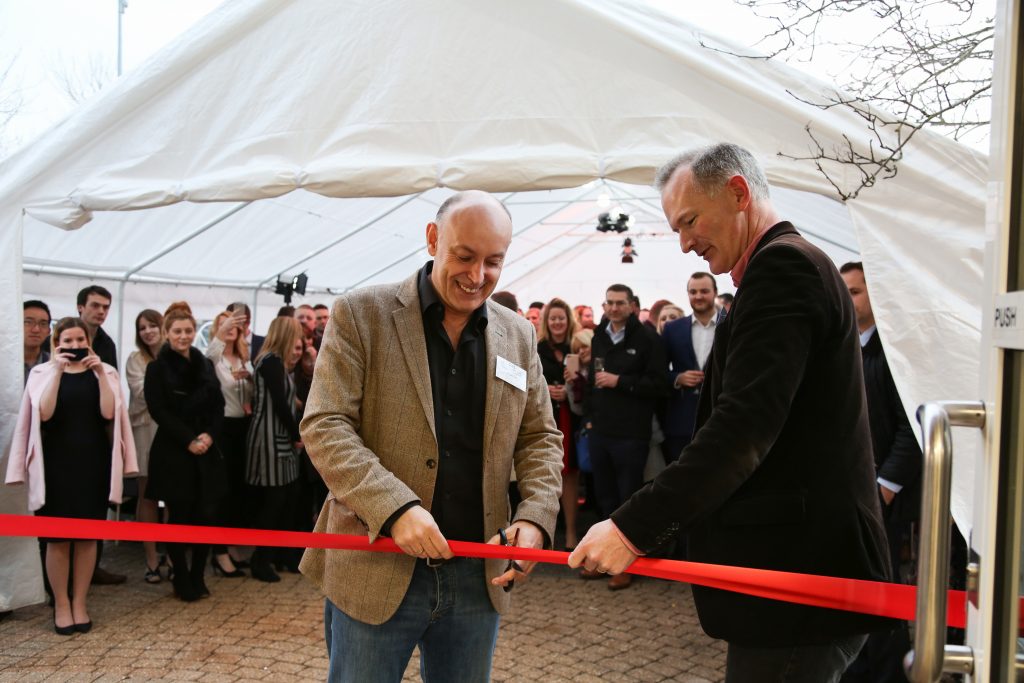 Andrew cutting the red ribbon at the Ascot opening event