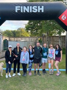 Ascot Group team members at the finish line after completing the Mendip Challenge 2026 charity walk to support Weston Hospicecare in Somerset.