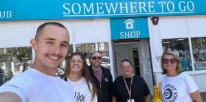 Ascot Group team outside Somewhere To Go charity shop in Weston-super-Mare during a volunteer day supporting the local homelessness charity.